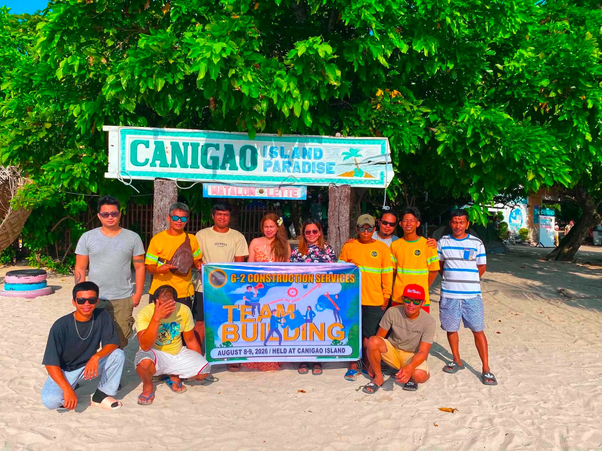 G2 Construction Services team gathered at the entrance to Canigao Island