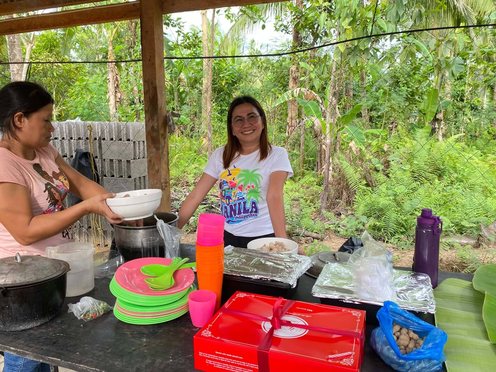 Team members preparing food together